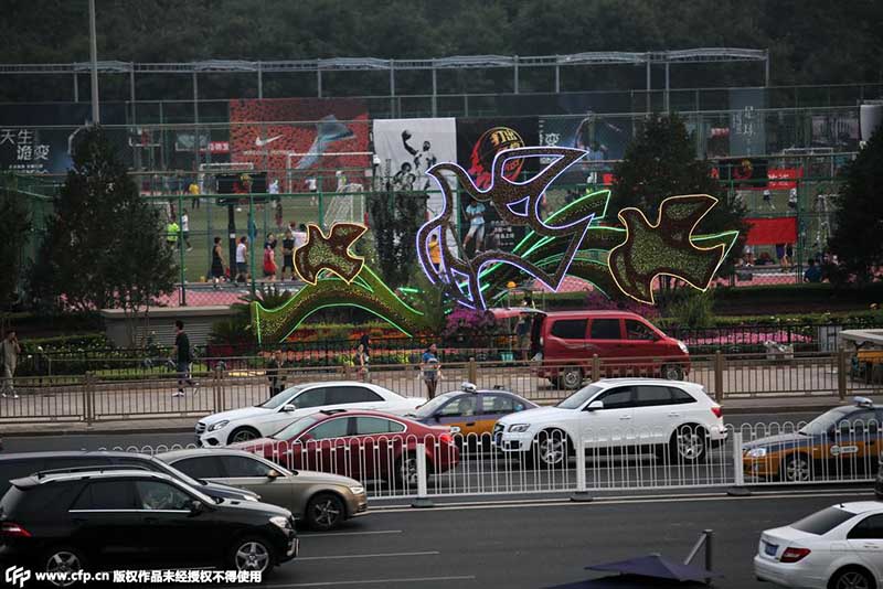 Canteiros de flores no centro de Beijing para celebrar aniversário da vitória contra agressão japonesa