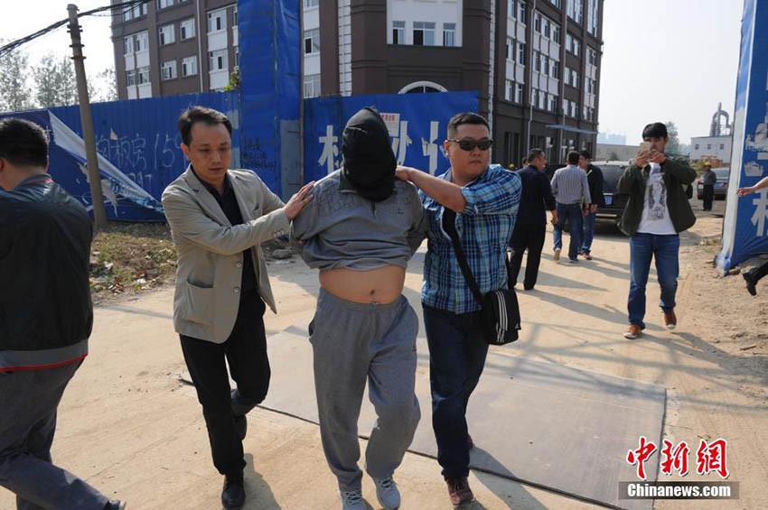 Alegado mentor de assalto a banco detido no centro da China 16 anos depois