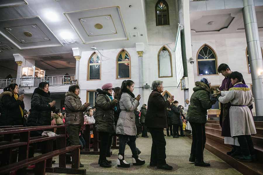 Época natalícia em aldeia católica no norte da China