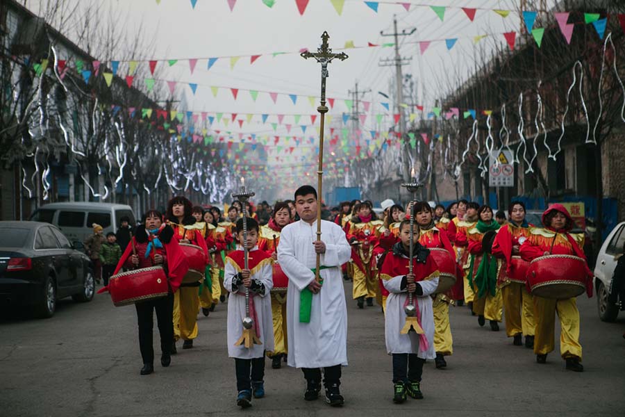 Época natalícia em aldeia católica no norte da China