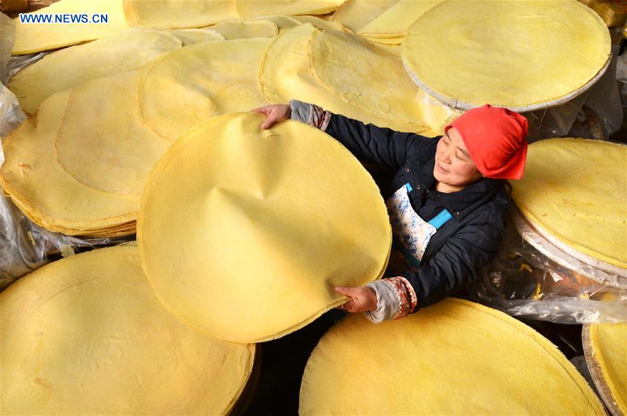 Moradores de vilarejo se preparam para o Ano Novo chinês