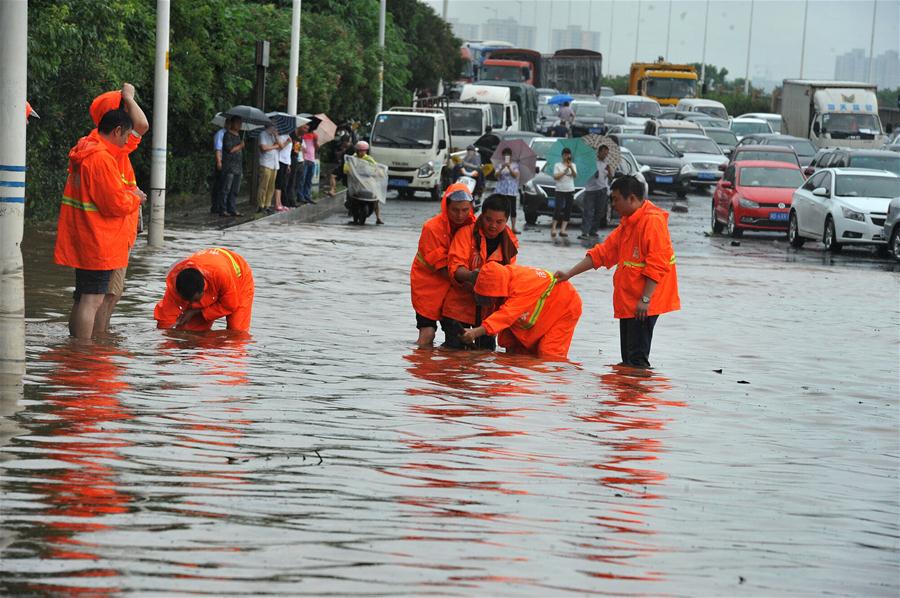 Chuva e deslizamentos de terra deixam 13 mortos e 13 desaparecidos na China