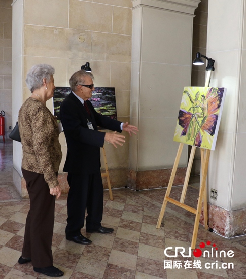 Artista chinês realiza exposição com temas olímpicos