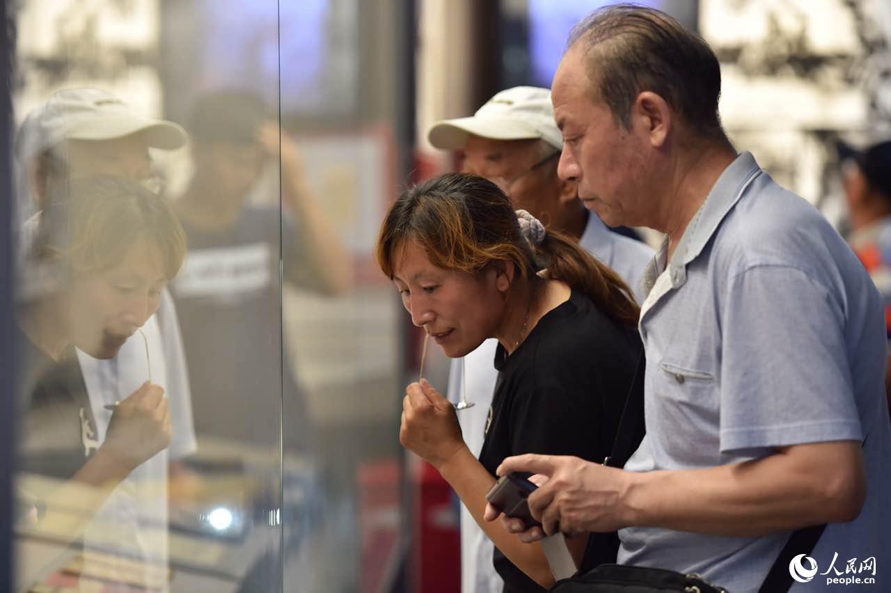 Visitantes acorrem ao museu memorial em homenagem ao 79º aniversário do Incidente da Ponte Marco Polo