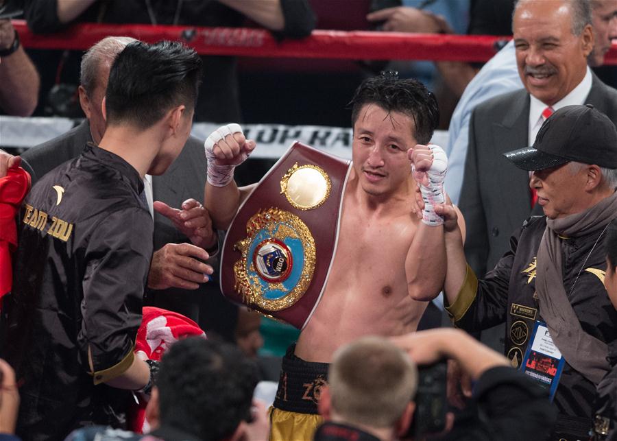 Chinês Zou Shiming é campeão mundial da categoria peso-mosca da WBO