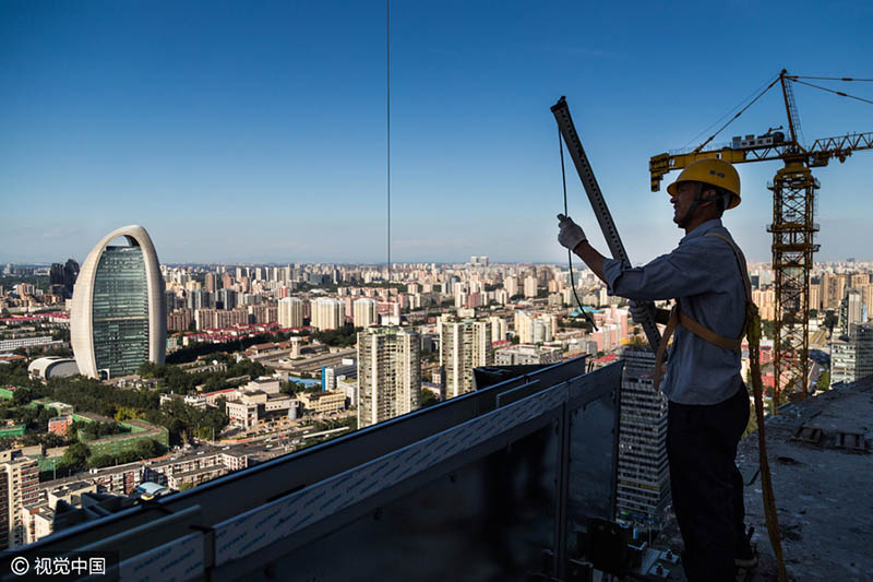 Os rostos por trás do edifício mais alto de Beijing