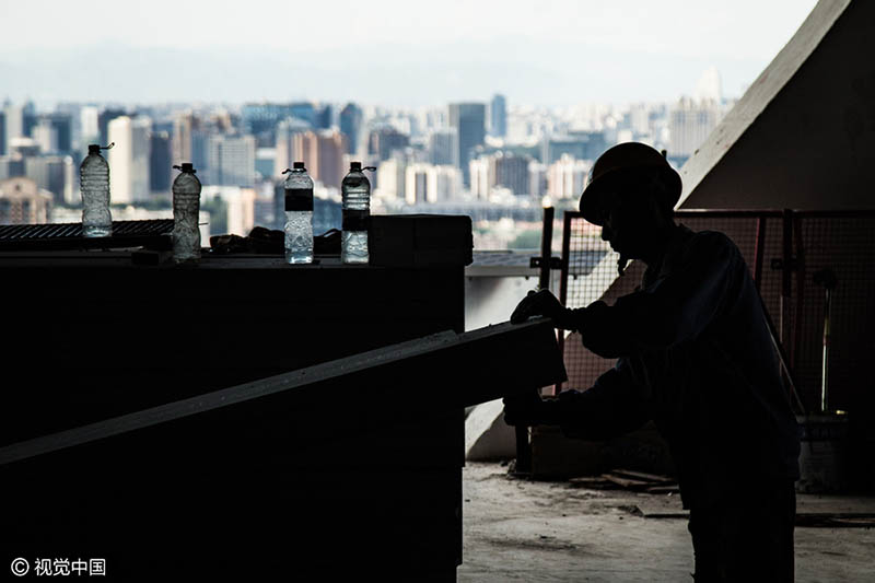 Os rostos por trás do edifício mais alto de Beijing