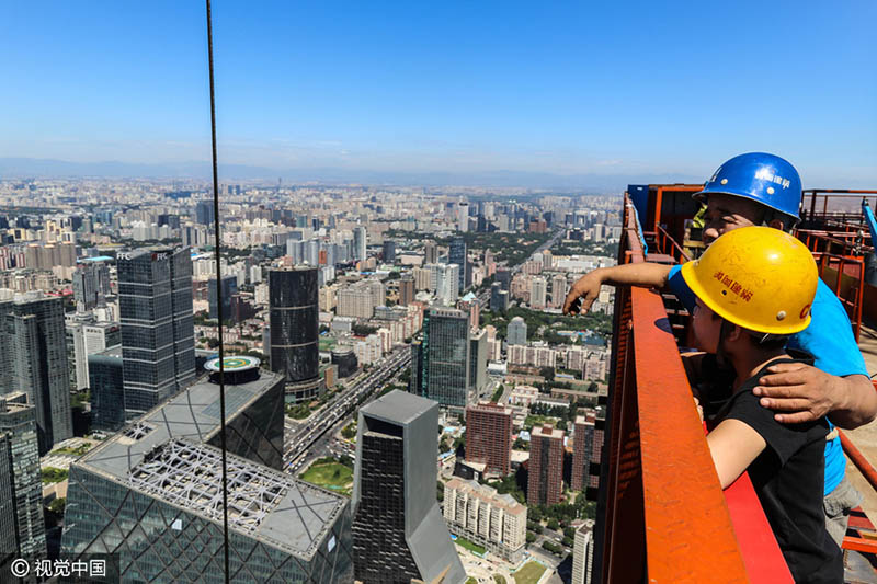 Os rostos por trás do edifício mais alto de Beijing