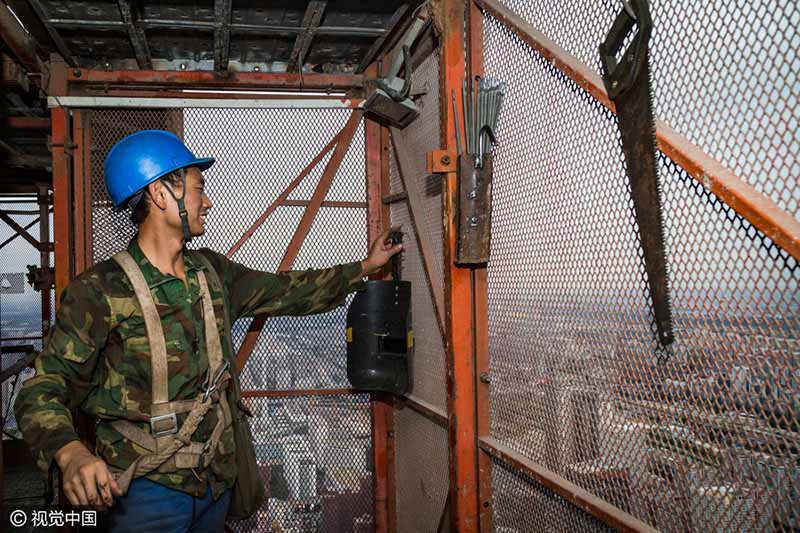 Os rostos por trás do edifício mais alto de Beijing