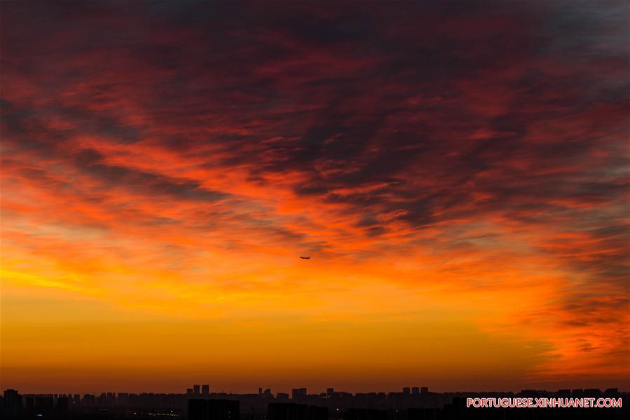 Brilho da manhã no céu de Beijing