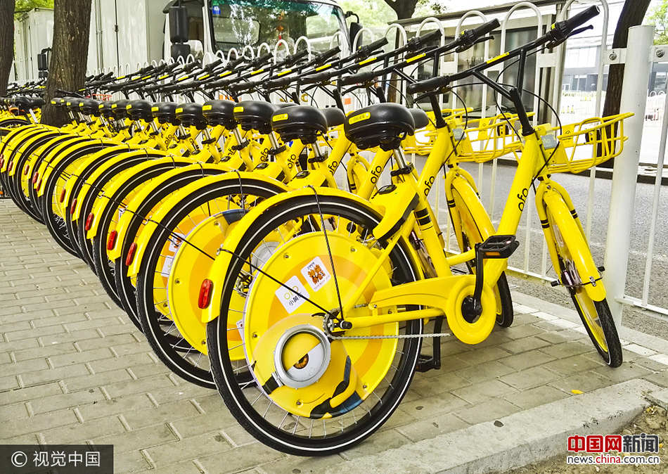 Bicicletas compartilhadas com novas grelhas eletrônicas para estacionamento em Beijing 