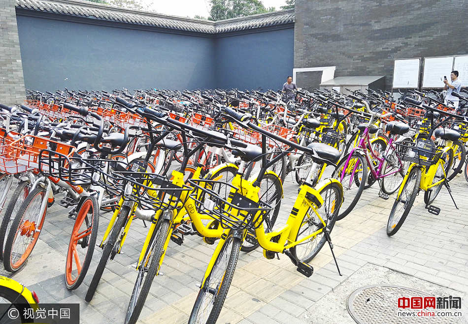 Bicicletas compartilhadas com novas grelhas eletrônicas para estacionamento em Beijing 