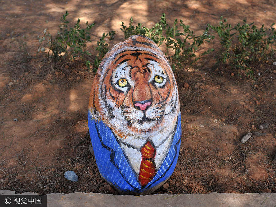 Pinturas 3D transformam vila chinesa em jardim zoológico