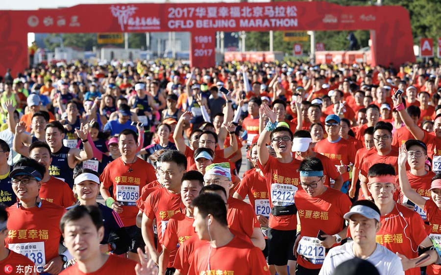 Corredores competem durante Maratona de Beijing 2017