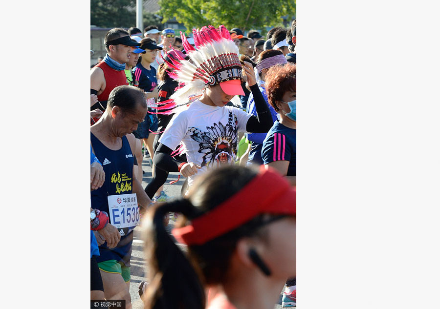 Corredores competem durante Maratona de Beijing 2017