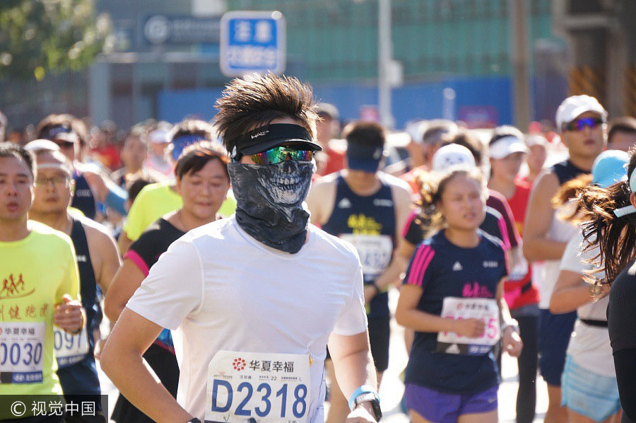 Corredores competem durante Maratona de Beijing 2017