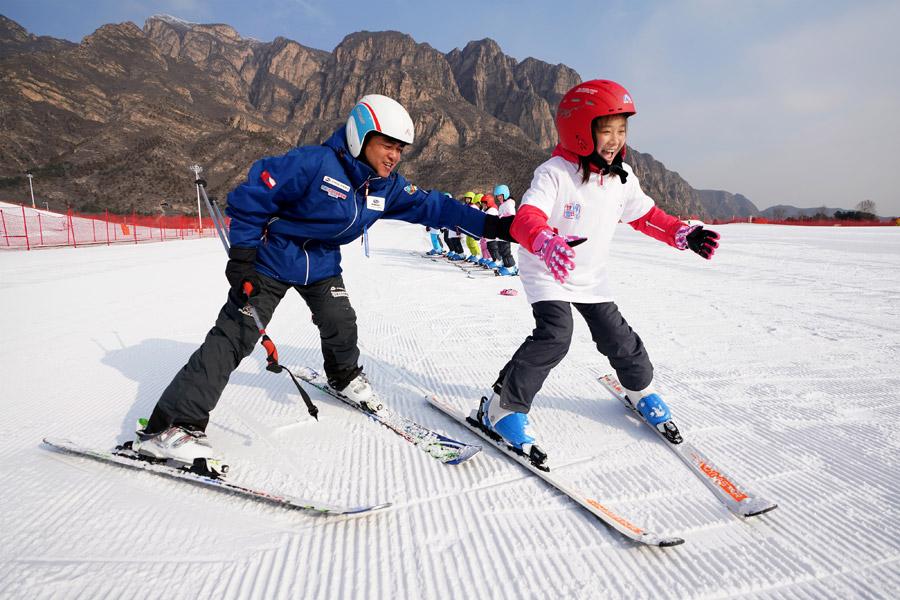 Galeria: Crianças celebram Dia Mundial da Neve em Beijing