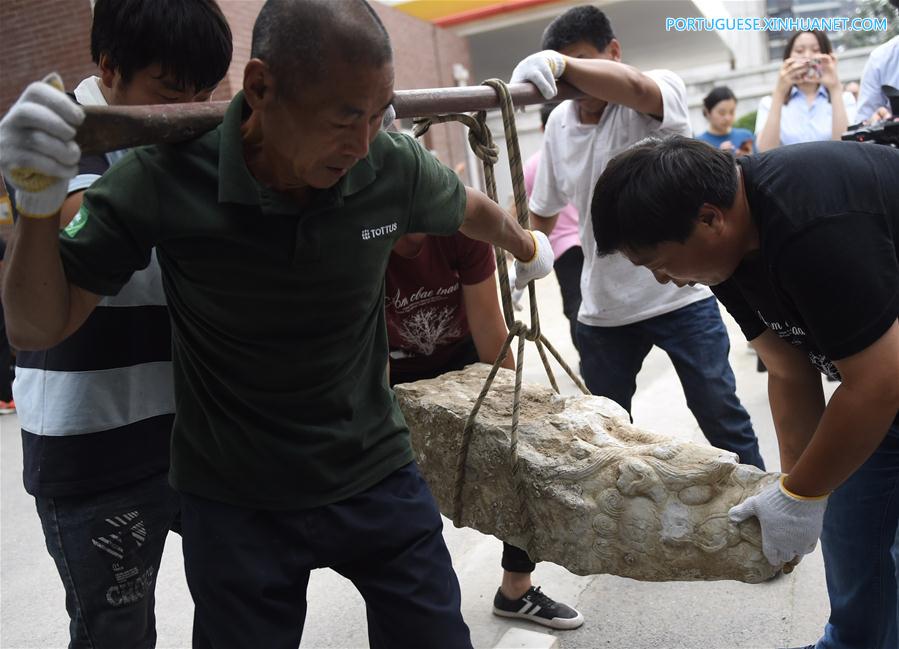 Quatro cabeças de dragão de mármore são devolvidas a Yuanmingyuan