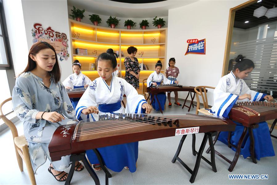 Galeria: Jovens aprendem artes tradicionais chinesas nas férias de verão