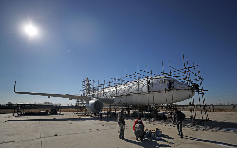 Galeria: Agricultor chinês realiza sonho e constrói modelo de avião