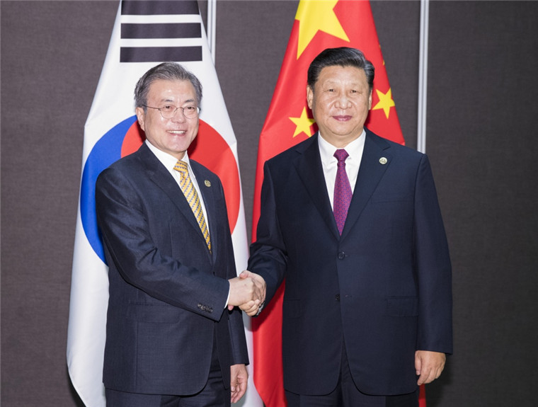 Xi e Moon discutem laços bilaterais e situação da Península Coreana