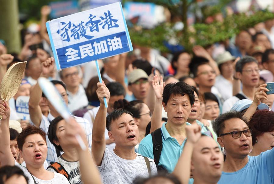 Residentes de Hong Kong organizam comício pedindo paz e estabilidade