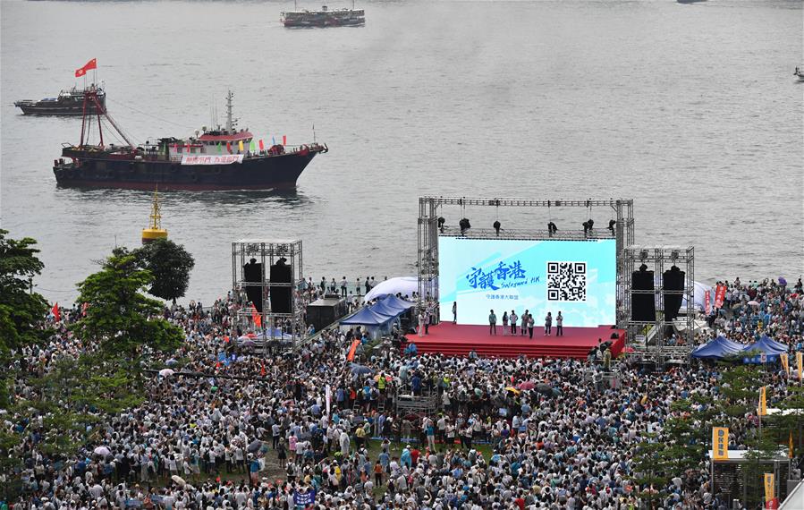 Residentes de Hong Kong organizam comício pedindo paz e estabilidade