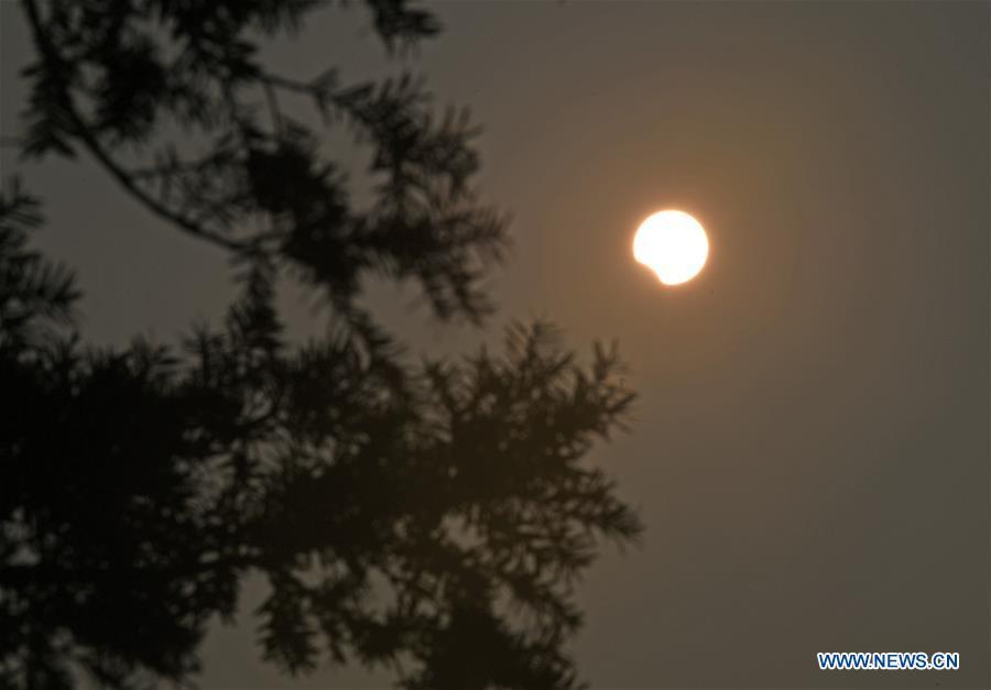 Galeria: eclipse solar parcial em Haikou