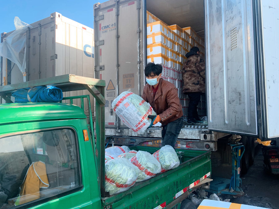 Maior mercado atacadista de Beijing recupera da epidemia de Covid-19

