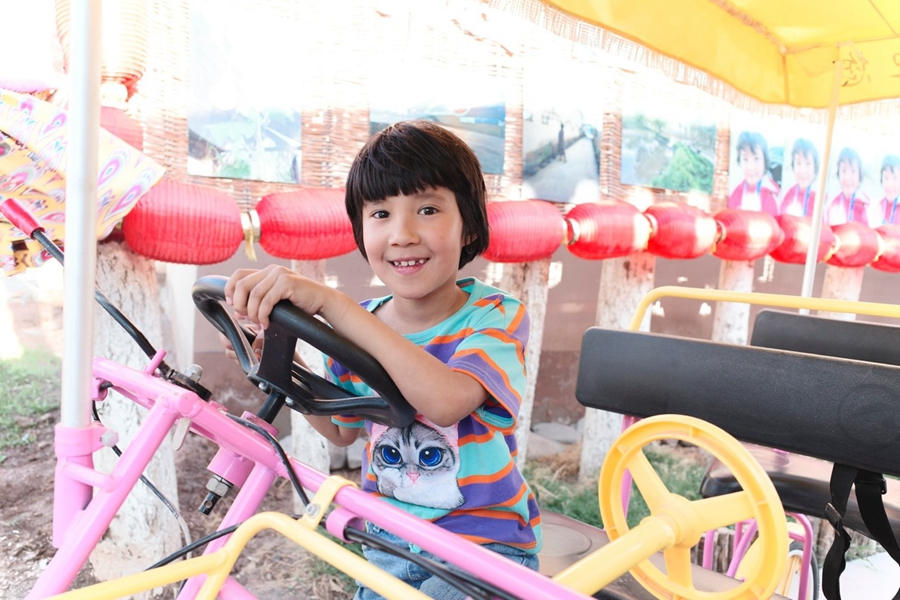 Crianças sorridentes em Xinjiang 