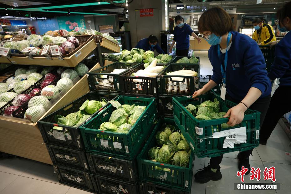 Beijing garante abastecimento de bens de consumo diário em meio a surto de Covid-19