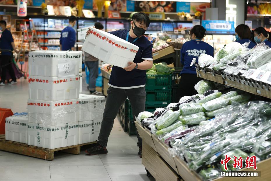 Beijing garante abastecimento de bens de consumo diário em meio a surto de Covid-19