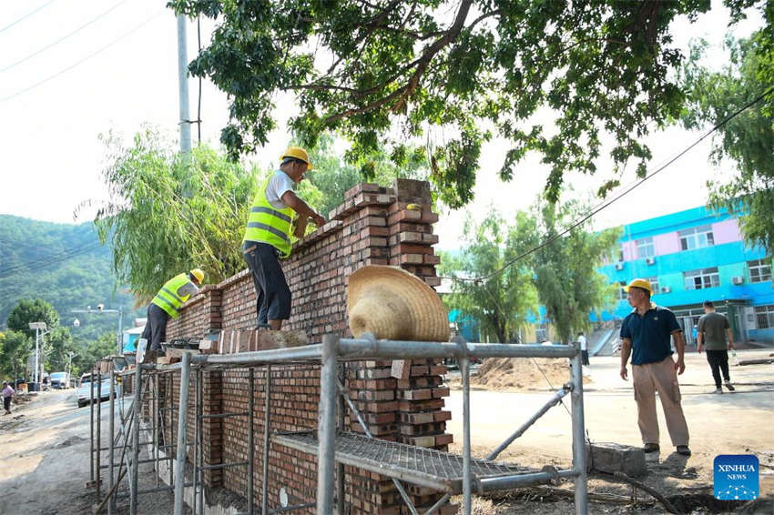 Beijing: escolas iniciam processo de reconstrução após cheias