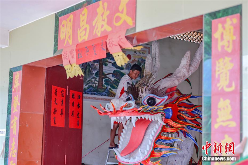 Hainan prepara cabeças de dragão para dar boas-vindas ao Festival do Barco-Dragão